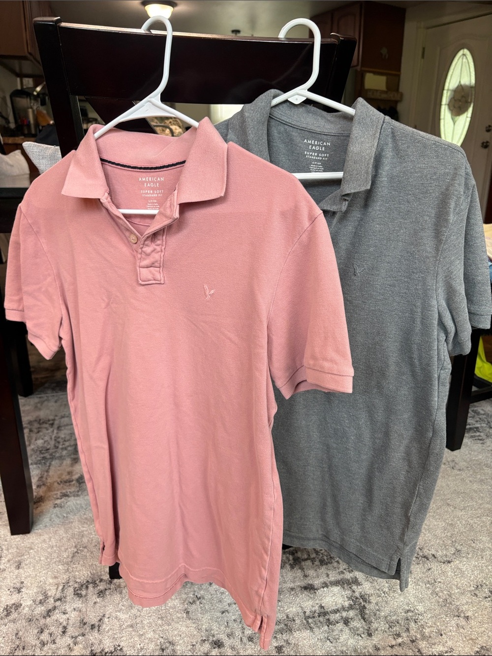 American Eagle Outfitters Men’s Pink and Gray Polo Shirts ($30 for both)